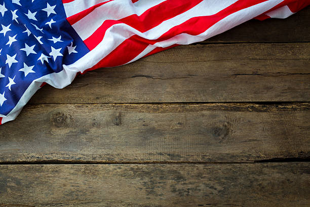 istock American flag on wood background 500429845