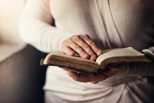 istock Woman with bible 500429868