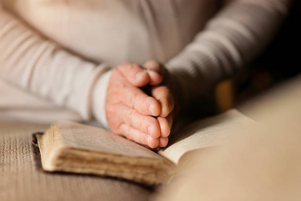 istock Woman with bible 500430030