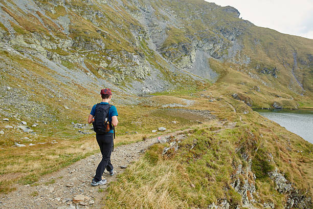 istock Teenage hiker on a trail 500430722