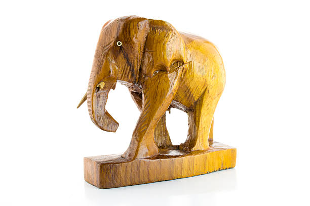 istock Wooden carved elephant tusk broken 500432743