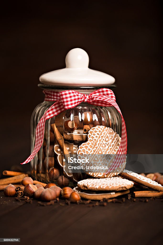 Gingerbread cookies in a jar on a wooden background Backgrounds Stock Photo