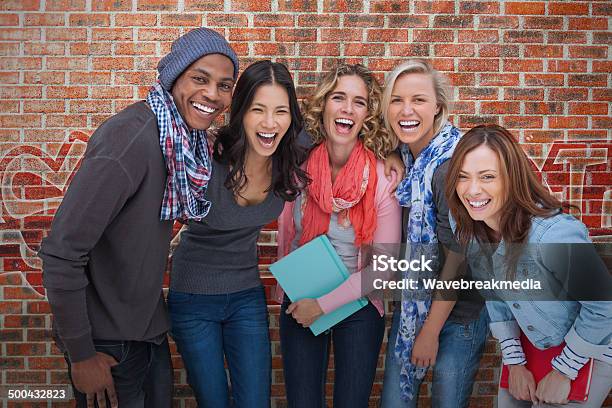 Smiling Group Of Friends Posing Together Stock Photo - Download Image Now - 20-29 Years, 30-39 Years, Adult