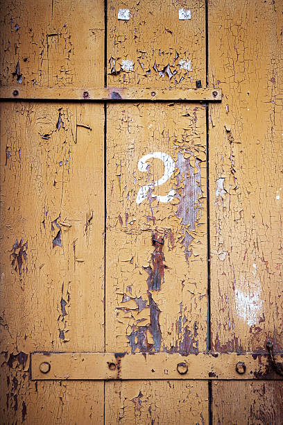 istock Number 2 on a wooden wall 500433223