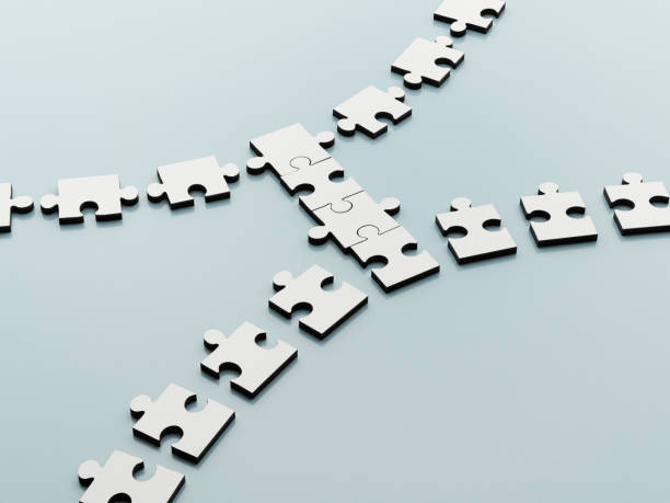 istock Jigsaw pieces bridging the gap 500434701