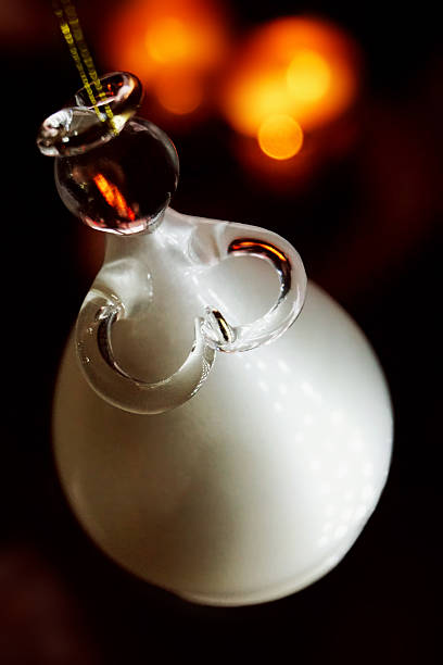 White Christmas Angel Against Blur  Lights