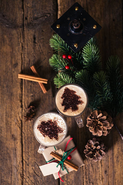 istock Cocoa on a wooden table with Christmas decorations, branches 500436332