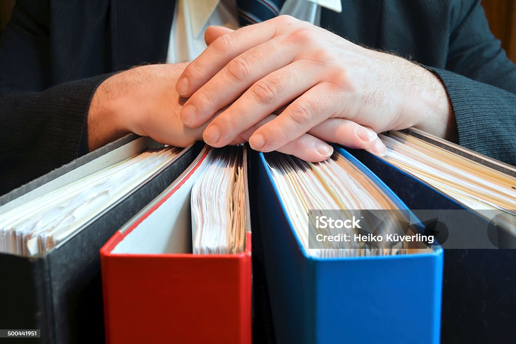 Businessman Businessman with file folders Civil Servant Stock Photo