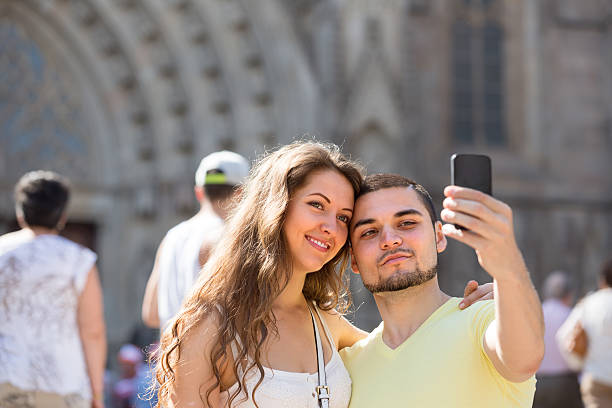istock Couple doing selfie at the street 500442809