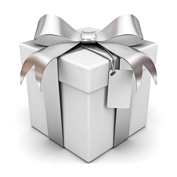 Gift box with silver ribbon bow and blank tag stock photo