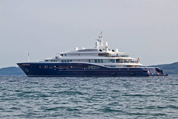 istock Megayacht floating on open sea 500443359