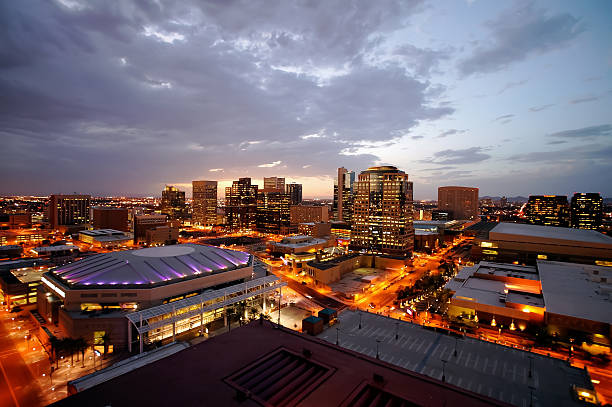 phoenix downtown lights - phoenix downtown district skyline city stock-fotos und bilder