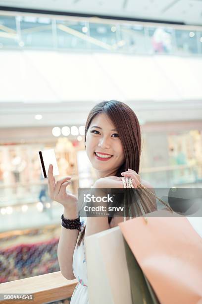 Girl Shopping At Luxury Mall In Kowloon Shanghai China Stock Photo - Download Image Now