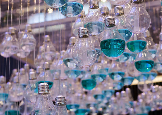 istock Close Up of Emerald Liquid in Light bulbs 500446603
