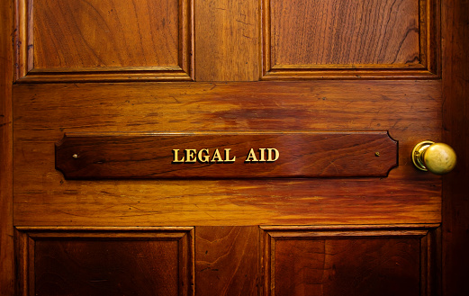 Legal aid sign on a door in an old courthouse, Bathurst, Australia.