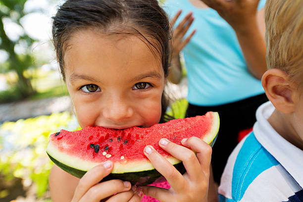 istock Girl with watermelon 500447511