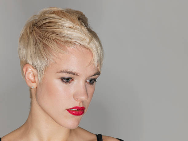 istock Woman With Red Lips Looking Down 500447693