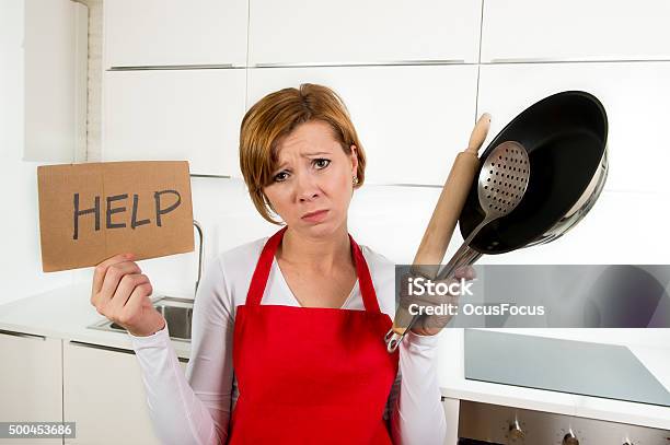 Home Cook Woman Holding Cooking Pan And Rolling Pin Stressed Stock Photo - Download Image Now