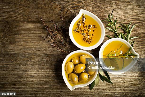 Olive Oil With Herbs Stock Photo - Download Image Now - Olive Oil, Olive - Fruit, Cooking Oil