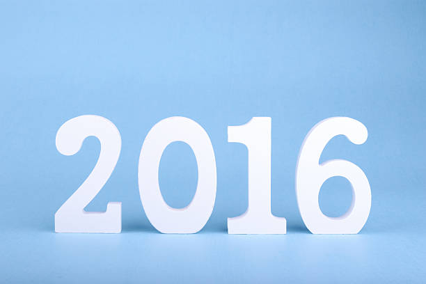 istock number 2016, as the new year, over a blue background 500454584