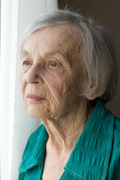 grand madre - senior adult fragility human eye wrinkled foto e immagini stock