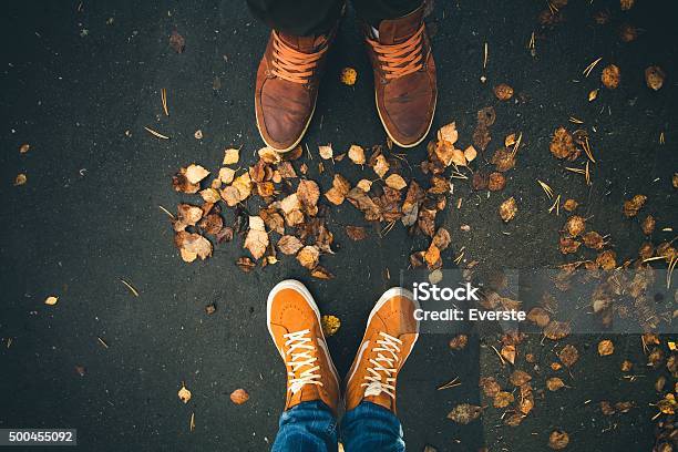 Couple Man And Woman Feet In Love Romantic Outdoor Stock Photo - Download Image Now - Autumn, Family, Couple - Relationship