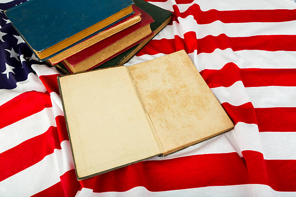istock Vintage open book on American flag 500455315