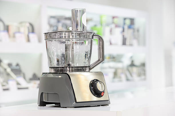 single electric food processor in retail store single electric food processor at retail store shelf, defocused background butter churn stock pictures, royalty-free photos & images
