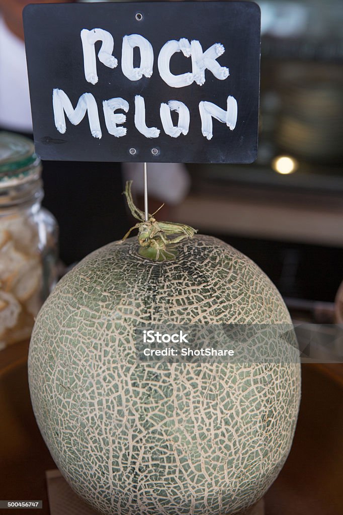 Rock Melon Rock Melon sign and fresh melon, selective focus  Agricultural Fair Stock Photo