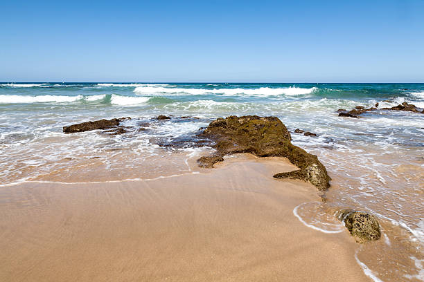istock Beach with village and blue sky 500458653