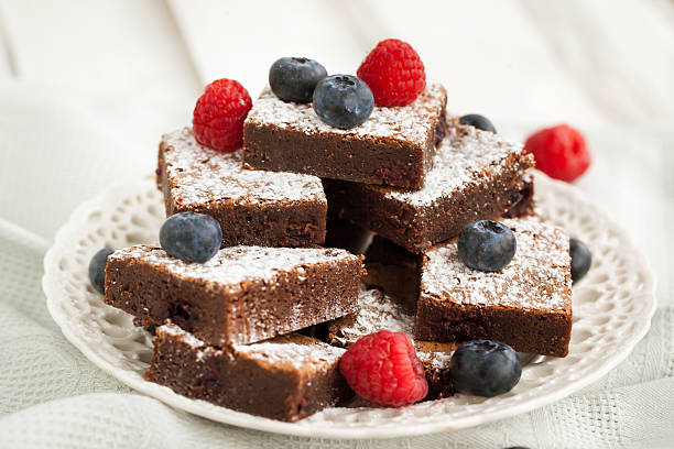 istock Chocolate brownies decorated with fresh berries 500460950
