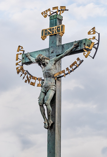 Large crucifix along the Charles Bridge in Prague's Old Town.