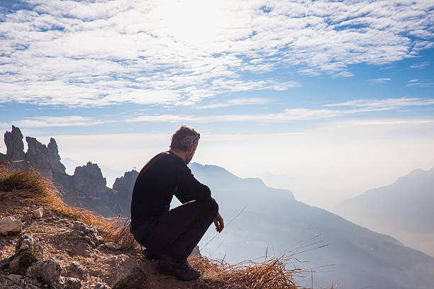 istock Mountaineer admires the mountain landscape 500465156