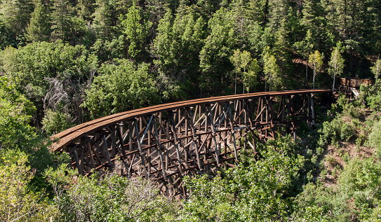 This wooden railroad trestle near Cloudcroft, New Mexico originally was used for logging and tourism from 1899 to 1947. The recreational site and overlook are now operated by the Lincoln National Forest.