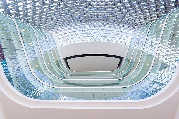 istock Looking up from the lobby of a modern building 500474157