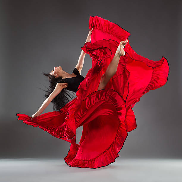 istock Red dress and dance emotions 500476737