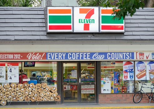 Fort Collins, Colorado, USA - September 6, 2012: People inside of a 7-Eleven convenience store. 7-Eleven is the world's largest chain of convenience stores. Headquartered in Japan, there are currently a total of 39,000 locations worldwide.