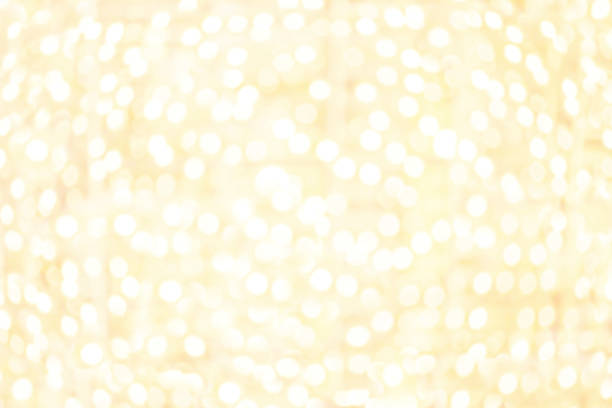 istock Abstract yellow defocused bokeh background with twinkling lights 500478870