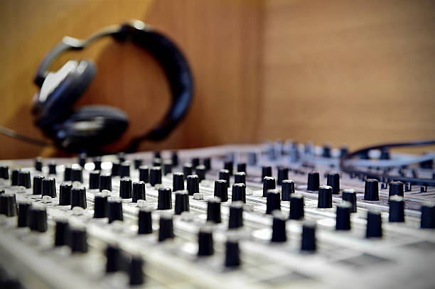 istock Professional soud mixer with headphones in background 500478920