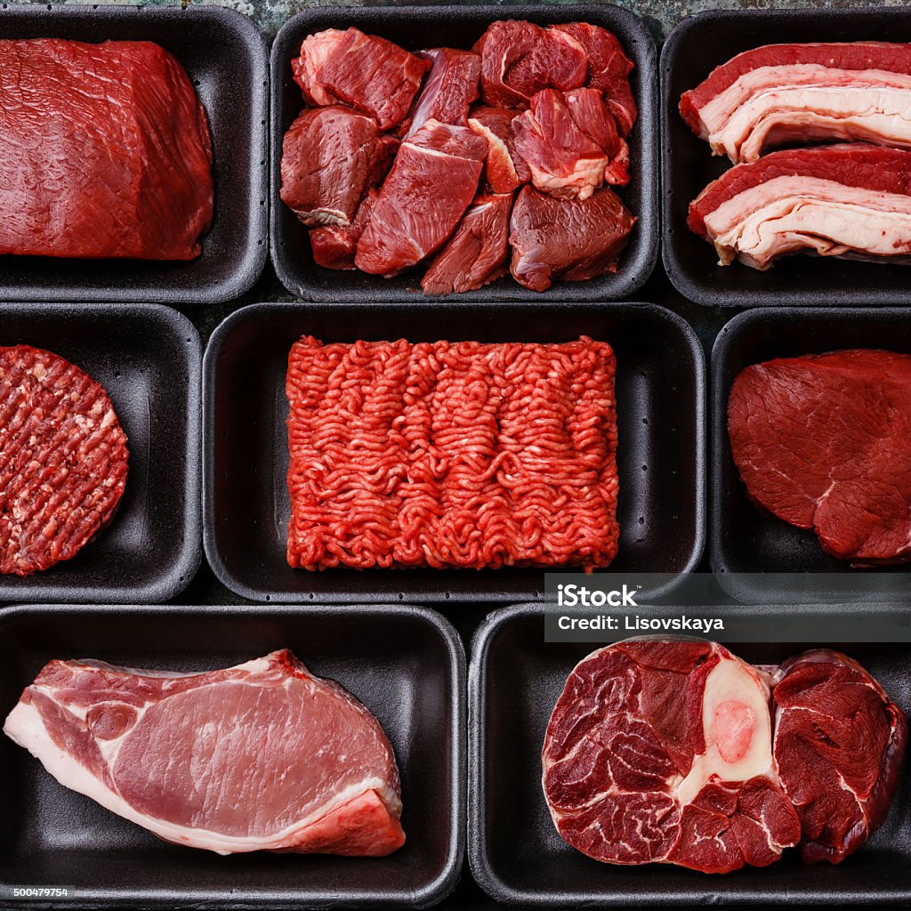 Different meat in plastic boxes Different types of meat in plastic boxes packaging tray Meat Stock Photo