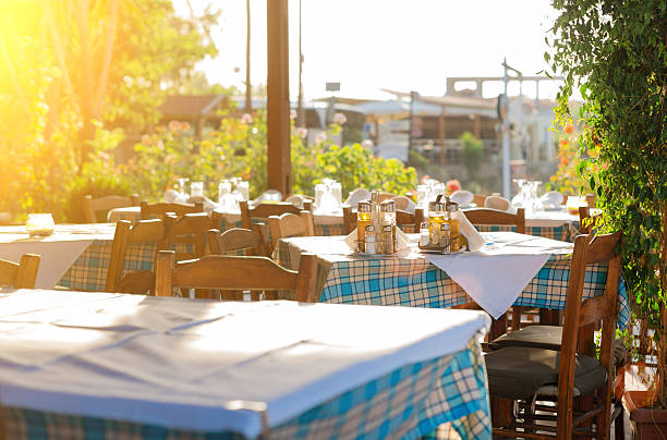 istock Mediterranean cafe terrace exterior with chairs. 500480536