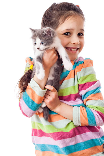 istock Happy little girl cuddle kitten 500484394