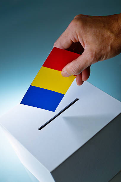 istock Romanian Election Voter Voting Ballot Over Ballot Box 500485592