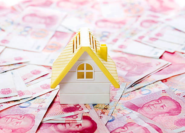 casa e dinheiro - investment rmb savings china imagens e fotografias de stock