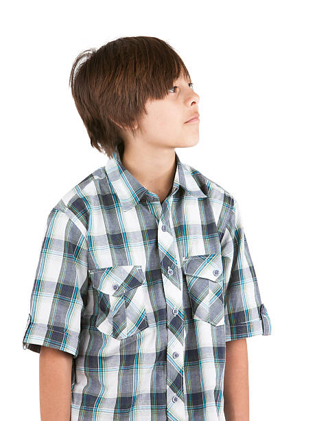 istock Young frowning boy isolated on white 500487014