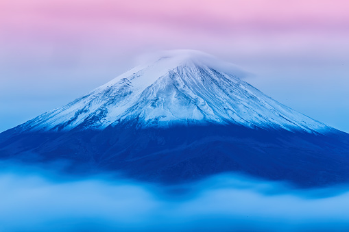Mount Fuji enshrouded in clouds from lake kawaguchi, Yamanashi, Japan