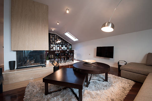 istock Interior of a modern loft apartment with fireplace 500488080
