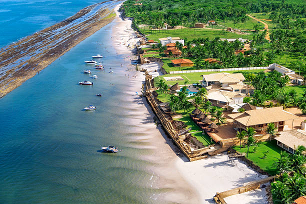 Maceio, northeast of Brazil Modern boats anchored in front of expensive beach mansions maceio photos stock pictures, royalty-free photos & images