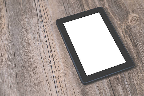 istock Digital tablet computer on old wooden desk 500490966