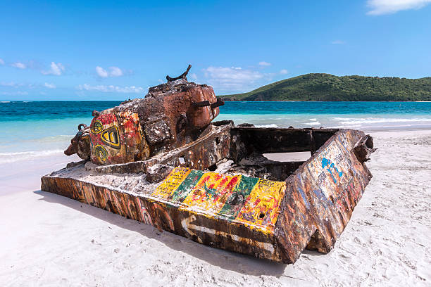 Flamenco Beach Rusted old tank covered in graffiti on famous Flamenco Beach on beautiful Isla Culebra, Puerto Rico culebra island photos stock pictures, royalty-free photos & images